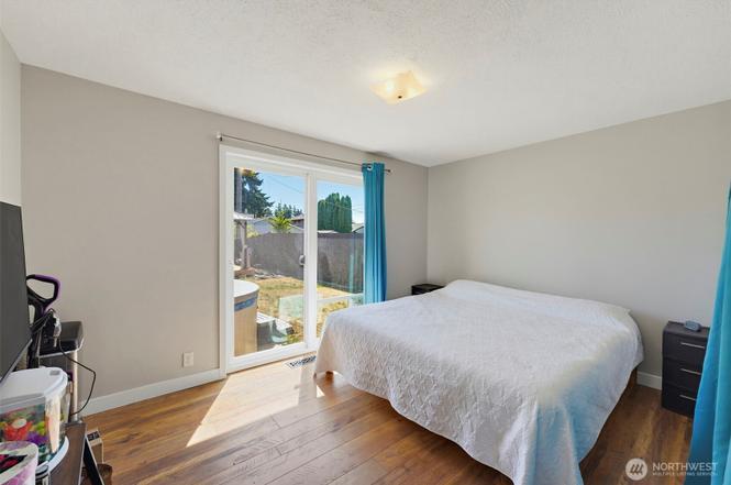 Primary bedroom to backyard