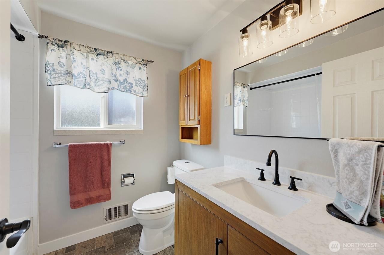 Primary bath with new marble vanity
